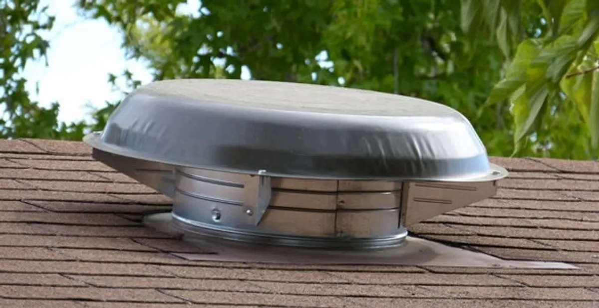 attic fan installation services with low-profile roof ventilation unit in Arlington, TX
